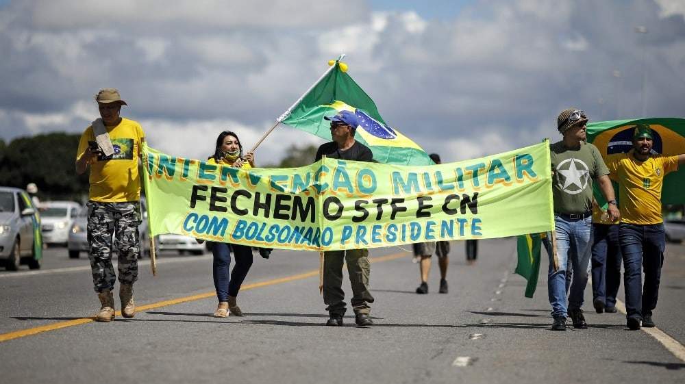 brazils bolsonaro joins protest against coronavirus restrictions 1