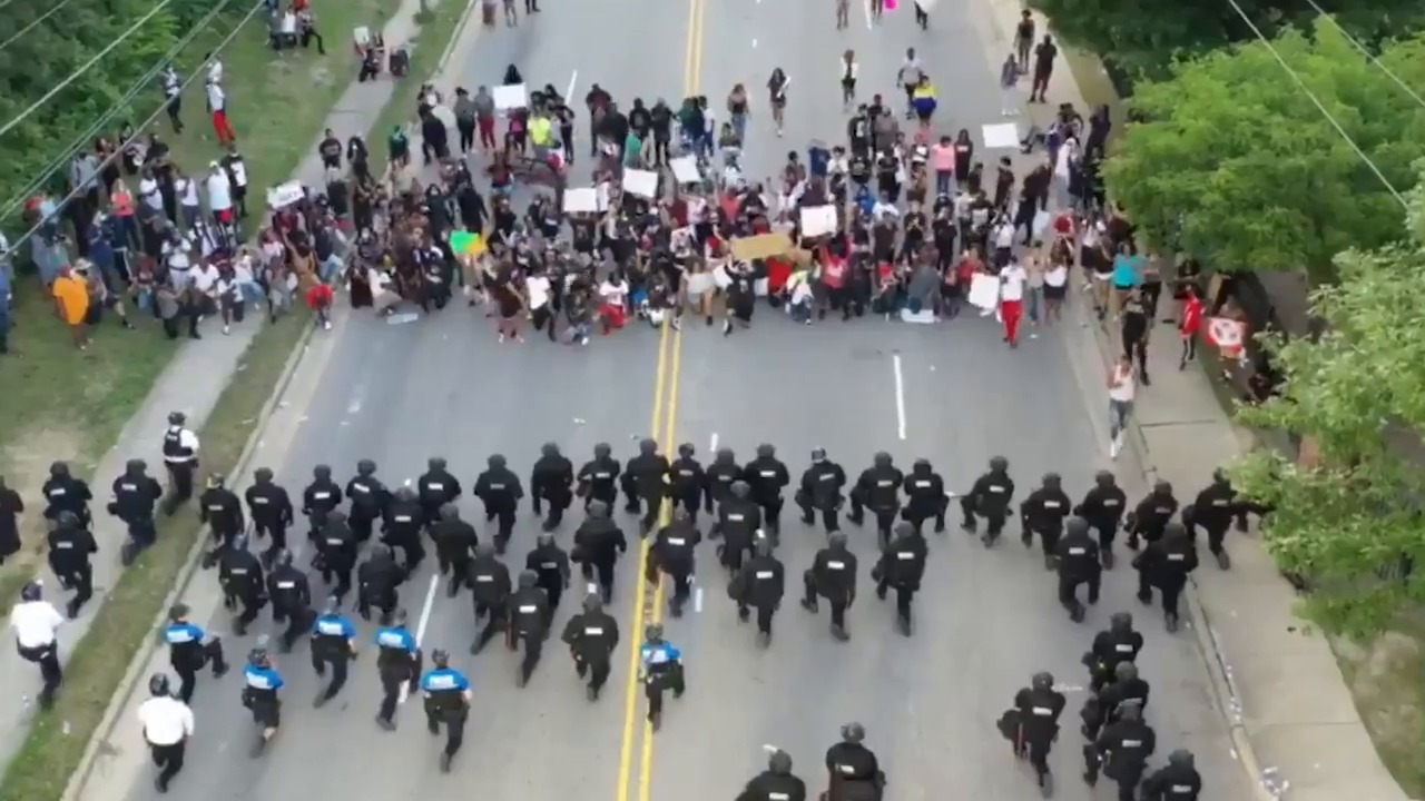 Tense Protest Turns Emotional As 60 North Carolina Police Kneel Before Demonstrators Upnow Media 